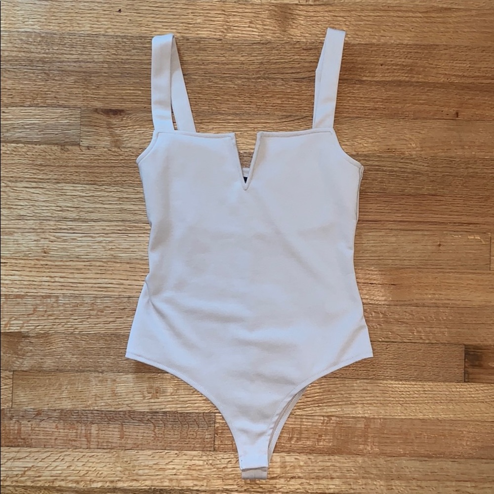 Beige boutique body suit